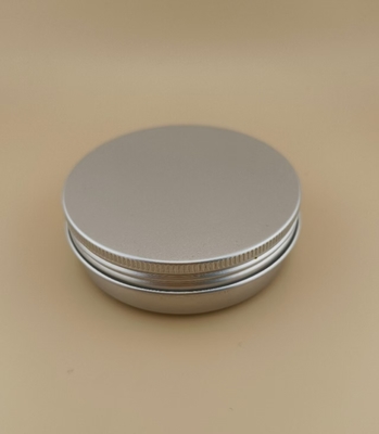 Cassa di alluminio argenteo grande con tappo a vite per cosmetici