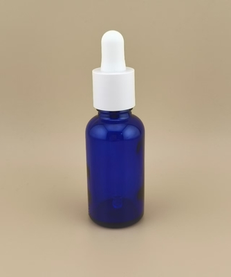 Design delicato, flacone contagocce rotondo liscio blu scuro trasparente per la cura della pelle