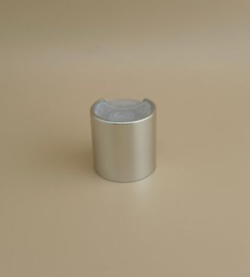 Tappo rotondo liscio in alluminio-plastica argentata con pulsante trasparente per flaconi per la cura della pelle