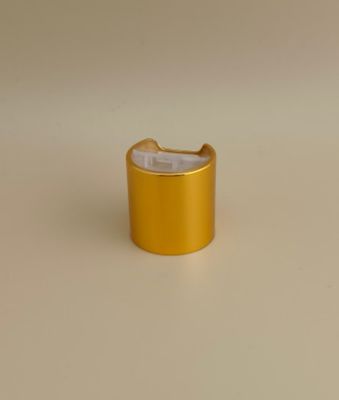 Tappo rotondo liscio in alluminio-plastica giallo con bottone trasparente per flaconi di prodotti per la cura della pelle