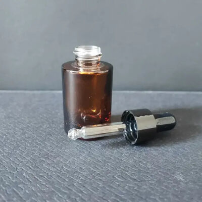 Best-seller trasparente 30 ml 1 oz imballaggio olio per capelli vuoto personalizzato gelato siero cosmetico gocciolante bottiglia di vetro con pipetta