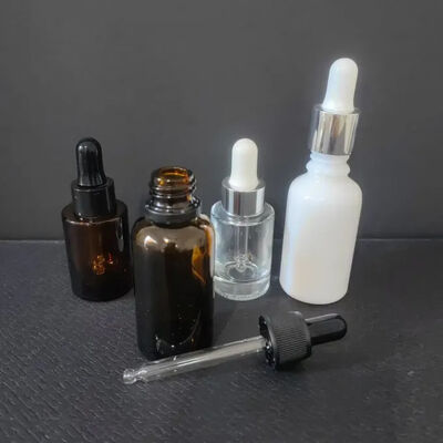 Vetro personalizzato Spalla inclinata 1 oz Capelli Occhi Essenza essenziale confezionamento Sero per la cura della pelle Bottiglia di 30 ml Bottiglia a goccia ghiacciata con scatola