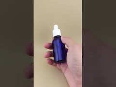 Design delicato, flacone contagocce rotondo liscio blu scuro trasparente per la cura della pelle