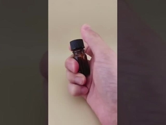 Design delicato, bottiglia rotonda liscia di vetro marrone trasparente per medicinali