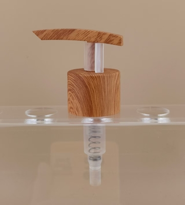 Pompa per lozioni Pompa di plastica per la distribuzione di cereali in legno Pompa K1104 per bottiglie