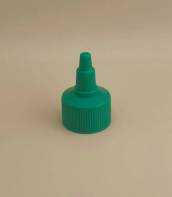 Tappo in plastica verde scanalato per flaconi di vernice