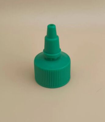 Tappo in plastica verde scanalato per flaconi di vernice