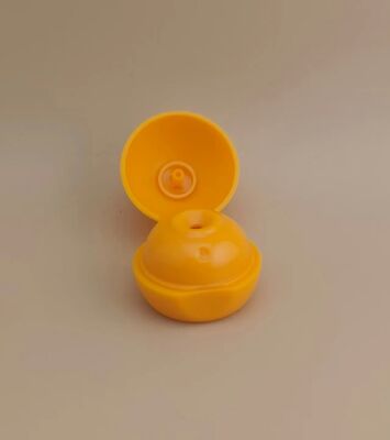 Coperchio sferico opaco liscio in plastica gialla per flaconi cosmetici
