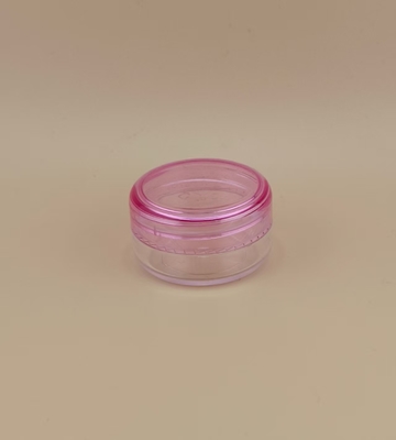 Vaso di crema di plastica trasparente certificata con coperchio a vite rosa per la cura della pelle e personalizzabile