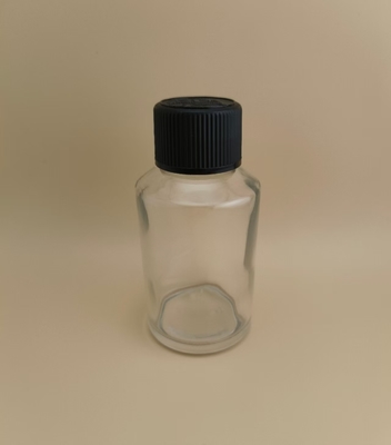 Design delicato, bottiglia rotonda liscia e trasparente in vetro con tappo speciale per medicinali