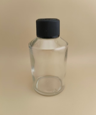 Design delicato, trasparente, liscio, rotondo, grande bottiglia di vetro con tappo speciale per medicinali