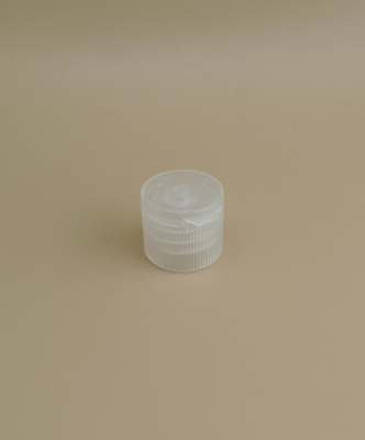 Cappuccio di plastica rotondo e trasparente per bottiglie cosmetiche