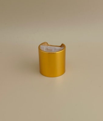 Tappo rotondo liscio in alluminio-plastica giallo con bottone trasparente per flaconi di prodotti per la cura della pelle